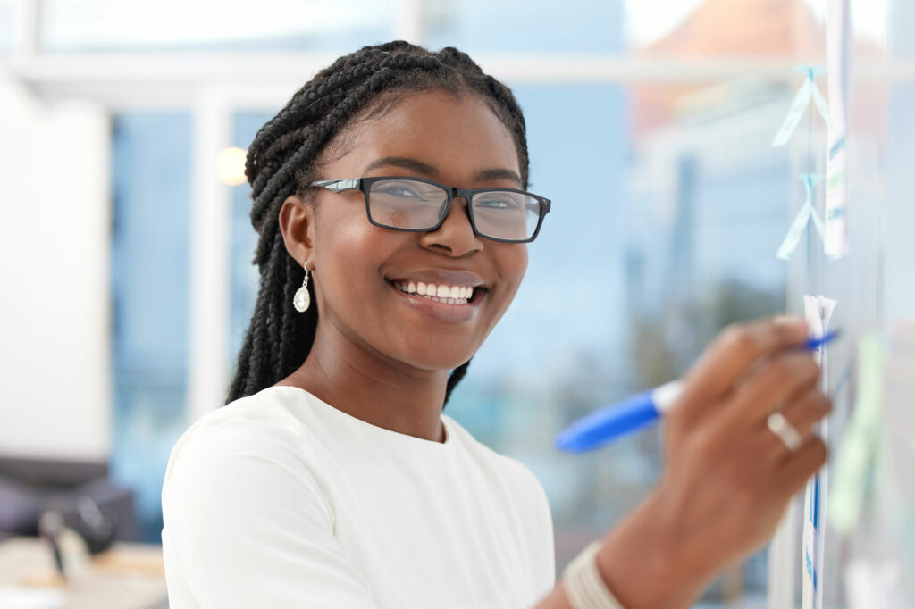 Reading teacher writing on a white board