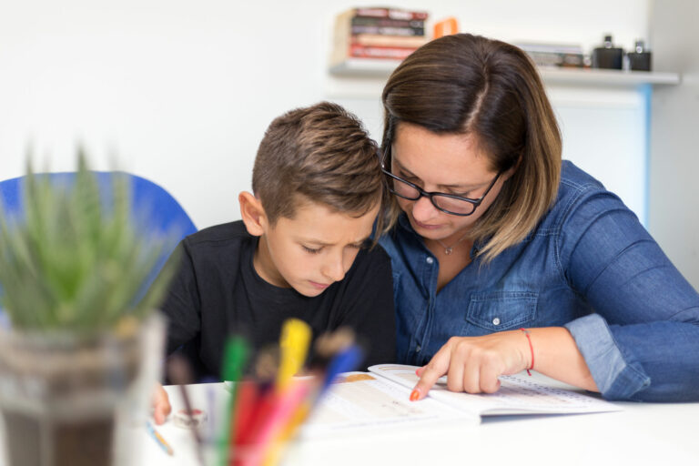 literacy expert helps middle school student with phonics intervention