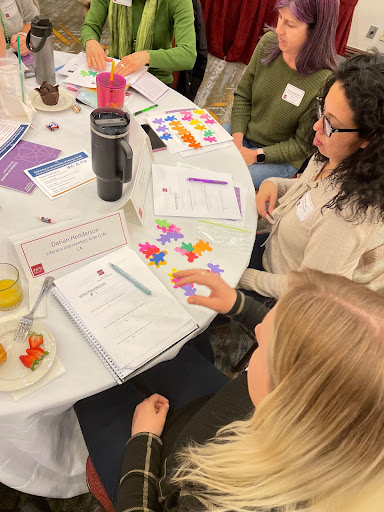 Teachers and literacy specialists try using phonics chip kits in a science of reading professional learning session