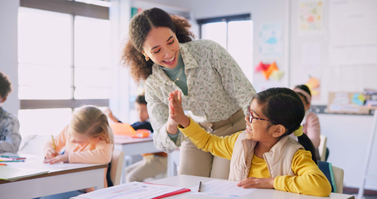 Teacher woman, high five girl and classroom with achievement