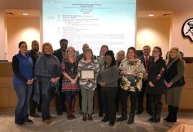 Photo of staff at Capital School District award presentation.