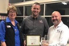 Photo of staff at Fairfax School District holding the R.E.A.D. Award.