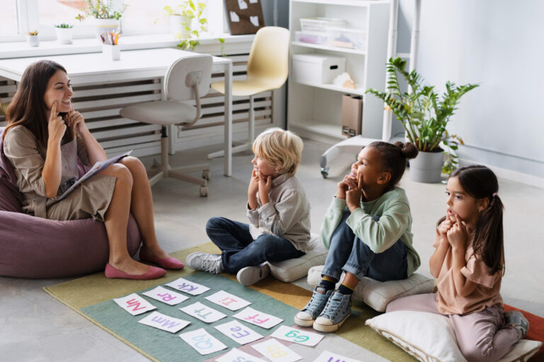 teacher leading phonics activities with elementary students