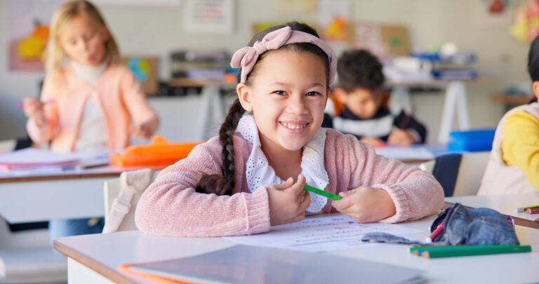 happy portrait of young student at elementary school